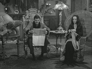 Gomez-and-Morticia-in-chairs-611x458