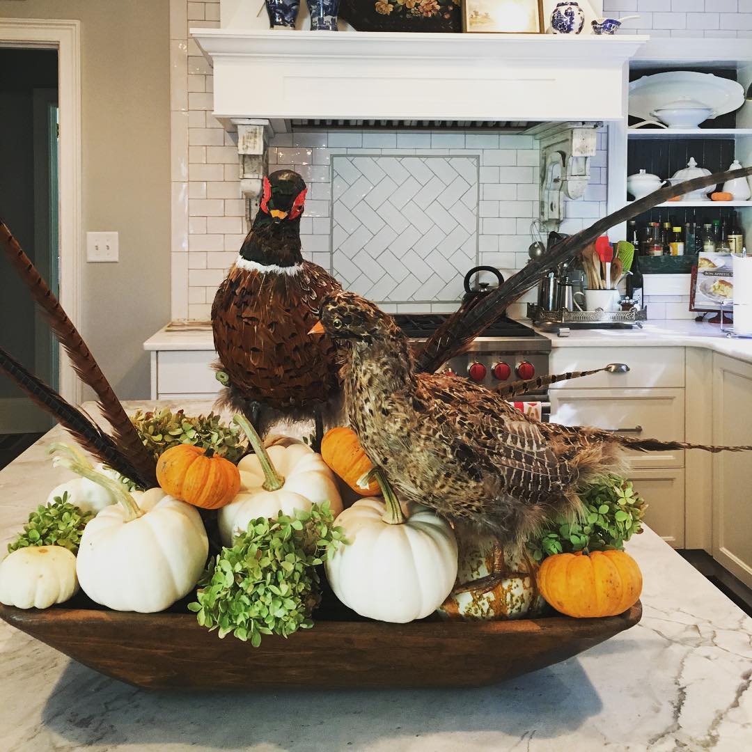 People always ask me what I do with all the junk I drag home. Today I went to an estate sale and picked up these ridiculous faux pheasants for $10. Took 'em home and stuck 'em in my antique dough bowl with some pumpkins and dried hydrangeas from the garden.  Cheap thrills