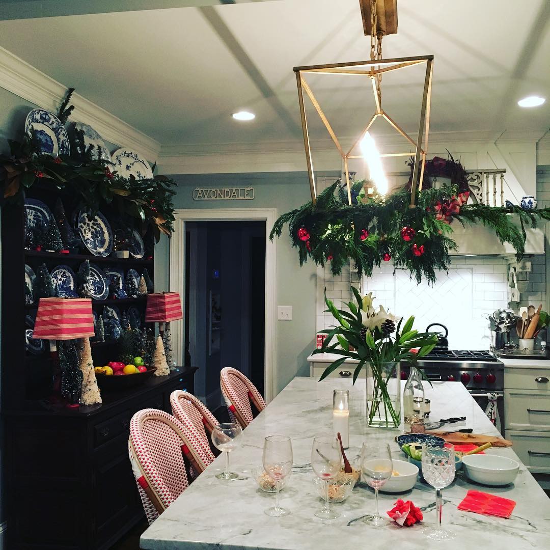 Had some neighbors drop in for drinks last night--because a clean, Christmas house is a terrible thing to waste. Kitchen bar stools are from @serenaandlily--and they are really comfy when you're polishing silver that hasn't been polished in a looong time...